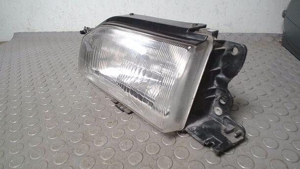 Foto: SCHEINWERFER LINKS ( KOITO ) eines Mazda 323 1.6i GLX