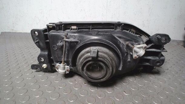 Foto: SCHEINWERFER LINKS ( KOITO ) eines Mazda 323 1.6i GLX