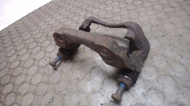 Foto: BREMSSATTELHALTER VORN LINKS eines Renault Espace 2000-1 TSE