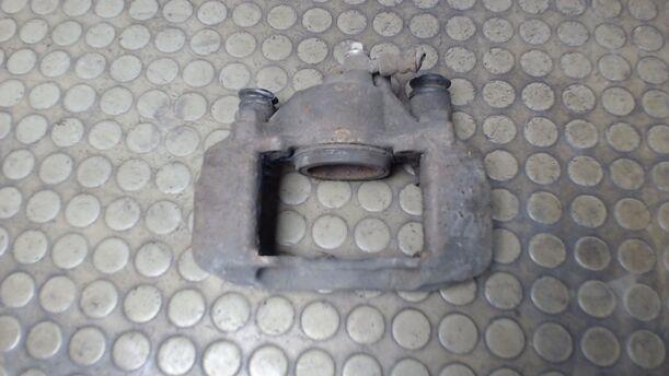 Foto: BREMSSATTEL VORN LINKS eines Mazda 323 F 1.9i 16V GT