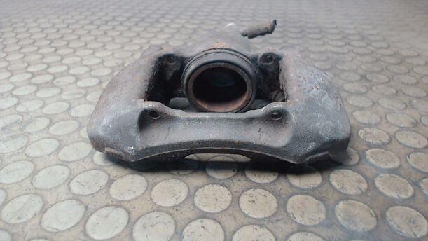 Foto: BREMSSATTEL VORN LINKS eines Mazda 323 F 1.9i 16V GT