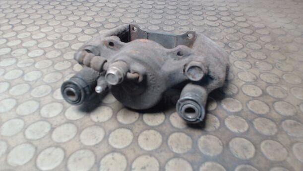 Foto: BREMSSATTEL VORN LINKS eines Mazda 323 F 1.9i 16V GT