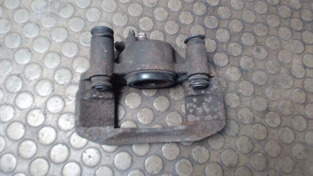 Foto: BREMSSATTEL VORN LINKS eines Mazda 323 F 1.9i 16V GT