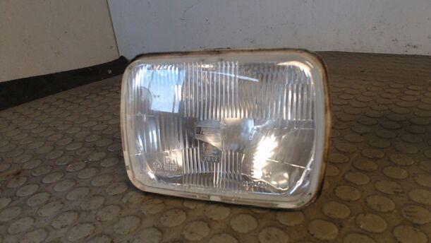 Foto: SCHEINWERFER LINKS eines Mazda 323 F 1.9i 16V GLX