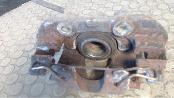 Foto: BREMSSATTEL VORN LINKS eines Opel Corsa Special