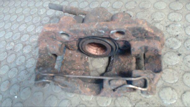 Foto: BREMSSATTEL VORN LINKS eines Opel Combo 1.7