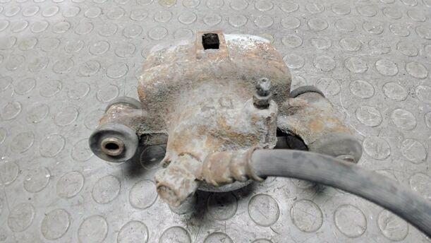 Foto: BREMSSATTEL VORN RECHTS eines Toyota Starlet 1.3 XLi