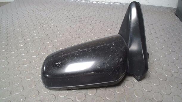 Foto: AUSSENSPIEGEL MECHANISCH VERSTELLBAR  LINKS eines Mazda 323 1.5 GLX