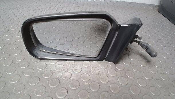 Foto: AUSSENSPIEGEL MECHANISCH VERSTELLBAR  LINKS eines Mazda 323 1.5 GLX