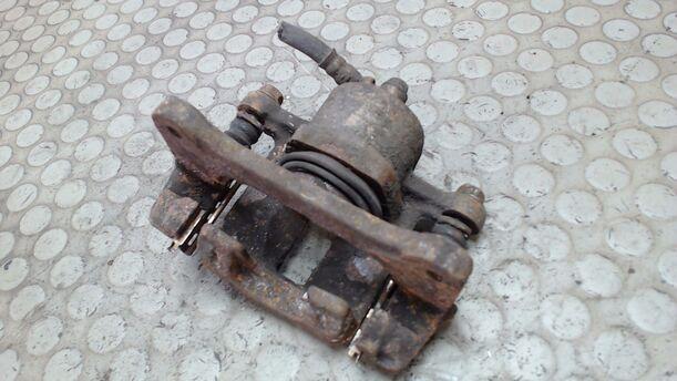 Foto: BREMSSATTEL VORN LINKS eines Nissan Sunny SLX