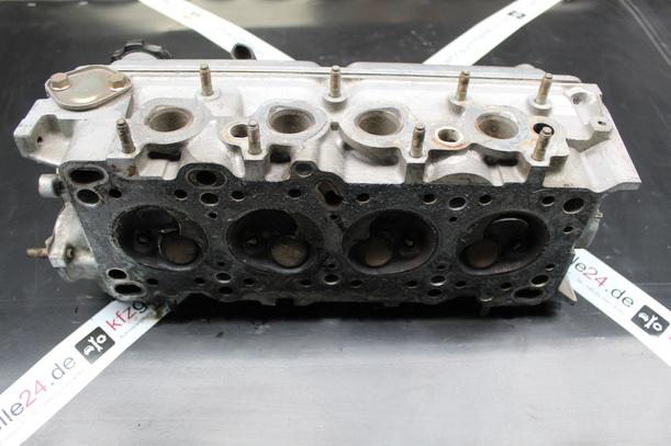 Foto: ZYLINDERKOPF B3E eines Mazda 323 1.4i LX