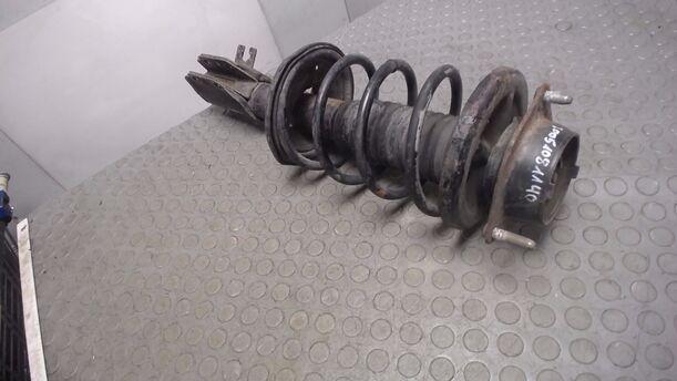 Foto: FEDERBEIN VORN LINKS eines Mazda 323 C 1.4