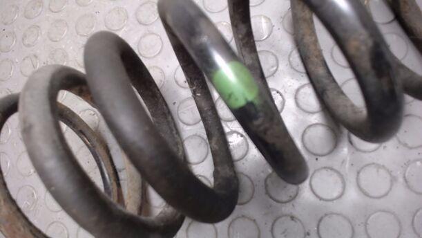 Foto: FEDER HINTEN LINKS eines Ford Escort C