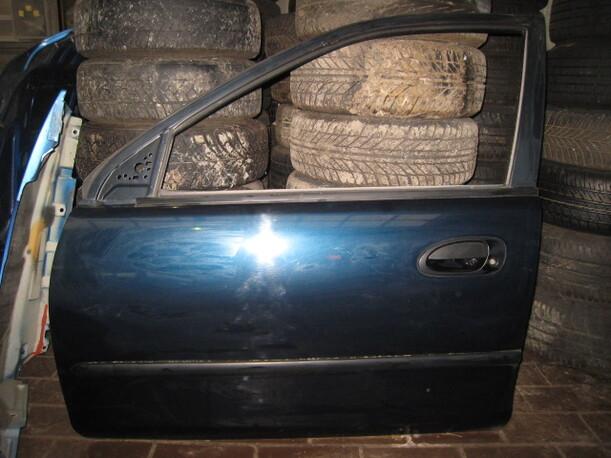 Foto: TÜR VORNE LINKS V L eines Mazda 323 S 1.5