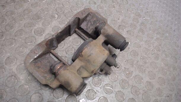 Foto: BREMSDSATTEL VORN LINKS eines Mazda 323 1.6i GLX