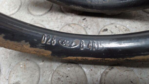 Foto: FEDER HINTEN LINKS eines Ford Sierra Turnier CL