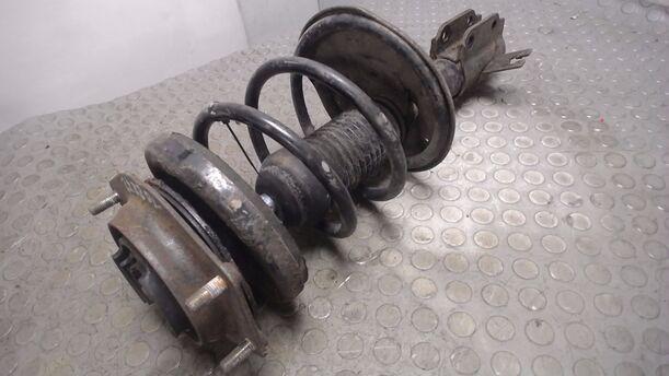 Foto: FEDERBEIN VORN LINKS eines Mazda 323 F 1.6i 16V