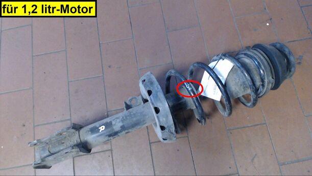 Foto: FEDERBEIN VORN RECHTS eines Opel Astra 1.2 CD