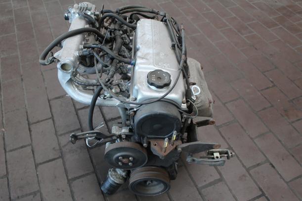 Foto: MOTOR 4G13 (Ölwanne beschädigt) eines Mitsubishi Colt 1300 1.6 LX