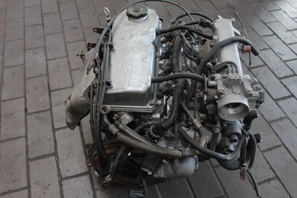 Foto: MOTOR 4G13 (Ölwanne beschädigt) eines Mitsubishi Colt 1300 1.6 LX