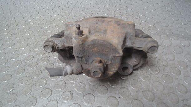 Foto: BREMSSATTEL VORN LINKS eines Nissan Primera Traveller Magnus