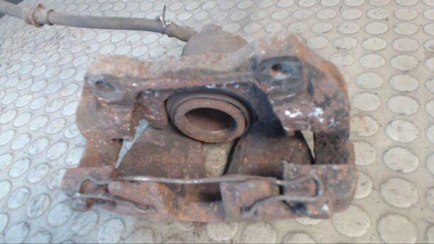Foto: BREMSSATTEL VORN LINKS eines Opel Astra 1.8