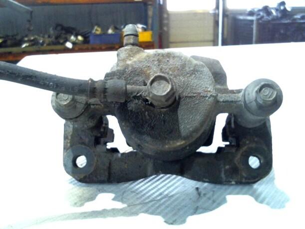 Foto: BREMSSATTEL VORN LINKS eines Suzuki Baleno Kombi 1.6