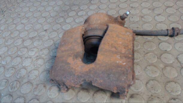 Foto: BREMSSATTEL VORN LINKS eines Opel Astra 1.6 Caravan