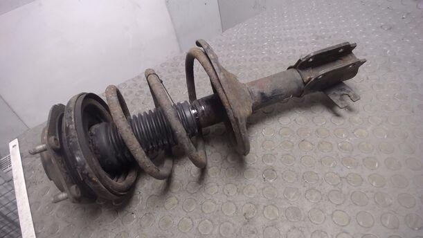 Foto: FEDERBEIN VORN LINKS eines Mazda 323 F 1.9i 16V