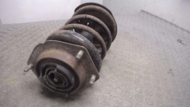 Foto: FEDERBEIN VORN LINKS eines Mazda 323 F 1.9i 16V