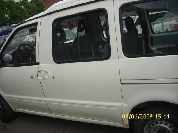 Foto: LADERAUMTÜR / SCHIEBETÜR HINTEN LINKS eines Nissan Vanette Cargo