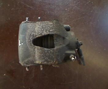 Foto: BREMSSATTEL VORN LINKS eines VW Golf 1.4