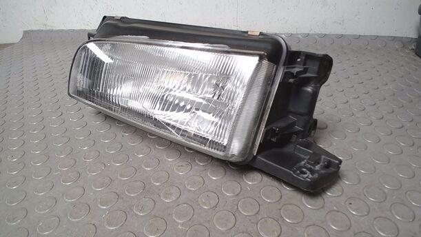 Foto: SCHEINWERFER LINKS eines Mazda 323 1.4i Classic