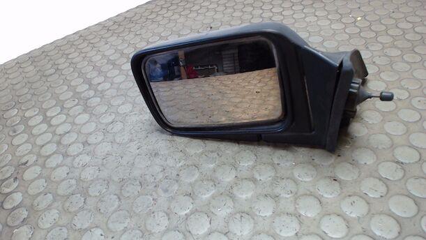 Foto: AUSSENSPIEGEL MECH. INNENVERSTB. LINKS eines Nissan Sunny CLX