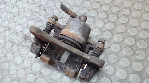 Foto: BREMSSATTEL VORN LINKS eines Nissan Sunny CLX