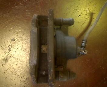 Foto: BREMSSATTEL VORN LINKS eines Mazda 626 2.0i