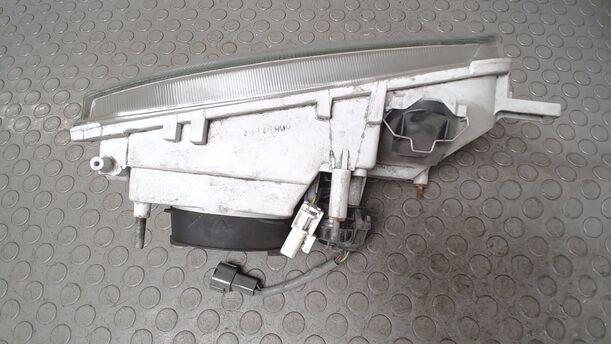 Foto: SCHEINWERFER LINKS eines Nissan Primera 1.6 CLX