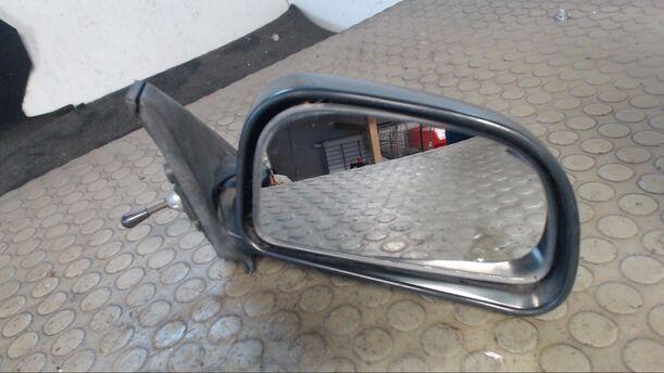 Foto: AUSSENSPIEGEL MECH. INNENVERSTELLB RECHTS eines Mitsubishi Colt 1300 GLS Komfort