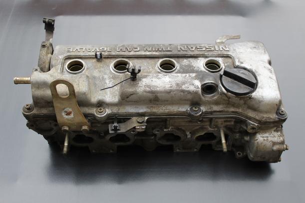Foto: ZYLINDERKOPF (MULTIPOINT) eines Nissan Sunny Color Line Chequers