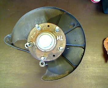 Foto: ACHSSCHENKEL HINTEN LINKS H L eines Mazda 626 2.0 Exclusive
