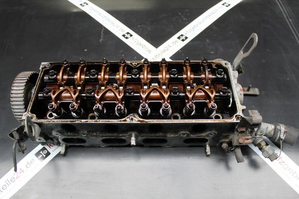 Foto: ZYLINDERKOPF eines Mazda 121 16V