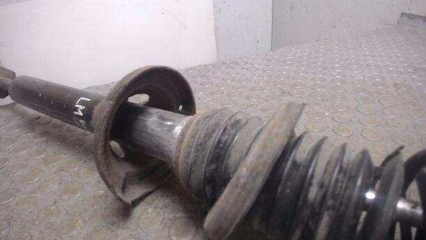 Foto: FEDERBEIN HINTEN LINKS eines Mazda 121 16V