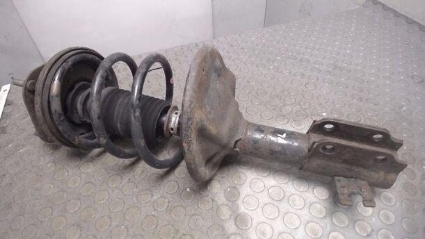 Foto: FEDERBEIN VORN LINKS eines Mazda 323 1.4i 16V