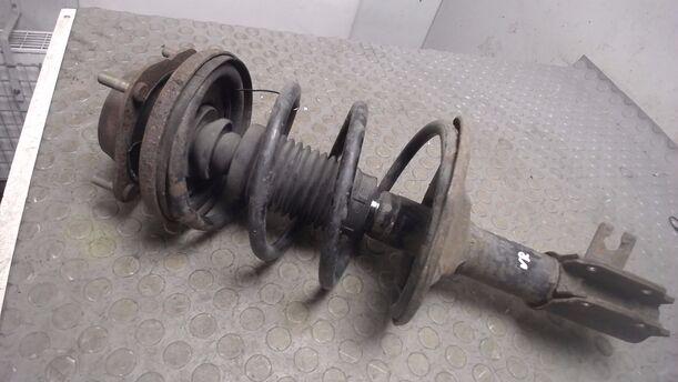 Foto: FEDERBEIN VORN RECHTS eines Mazda 323 1.4i 16V