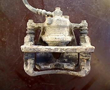 Foto: BREMSSATTEL VL eines Opel Corsa 1.2 16V