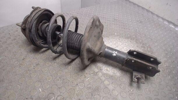 Foto: FEDERBEIN VORN LINKS eines Mazda 323 1.4i 16V
