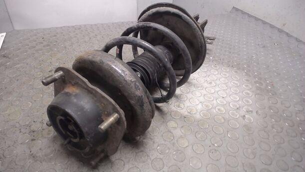Foto: FEDERBEIN VORN LINKS eines Mazda 323 1.4i 16V
