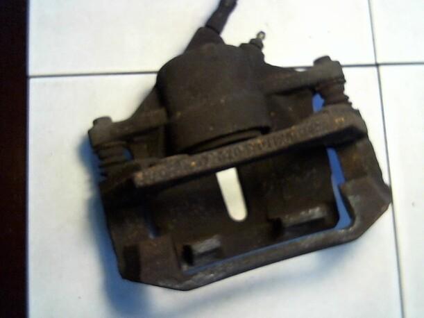 Foto: BREMSSATTEL VORN RECHTS eines Ford Mondeo 1.8 Turnier