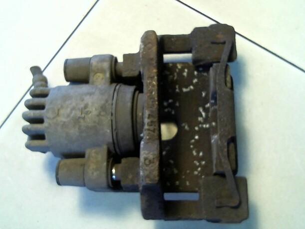 Foto: BREMSSATTEL HINTEN LINKS eines BMW 540i touring