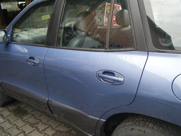 Foto: TÜR HINTEN LINKS eines Hyundai Santa Fe 2.7 V6 4WD